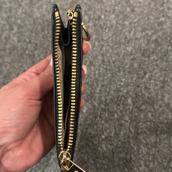 Michael Kors keychain wallet
BRAND NEW ! 
Cute taxi detail - Picture 3 of 4